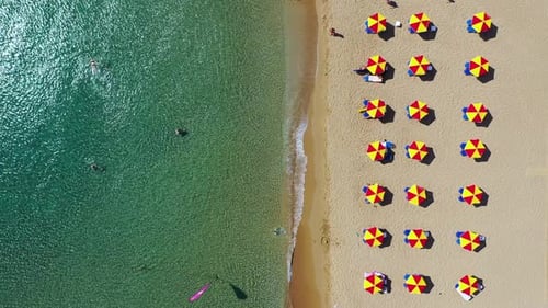 Concept of summer vacation. View from above, stunning aerial view of an amazing beach with beach umb