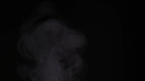 Wispy Smoke Effect Against Black Background