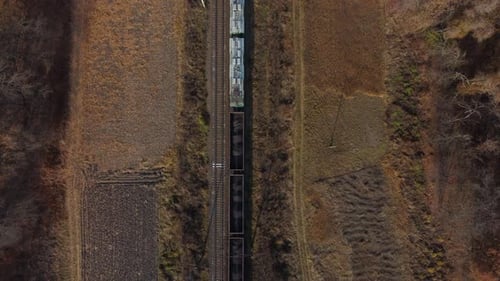 Aerial Drone View Flight Over Movement Train with Carriages Filled Coal Autumn