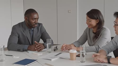 Collaborative Business Meeting in Bright Modern Office