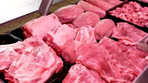 Discovering the art of butchered meats in a bustling market