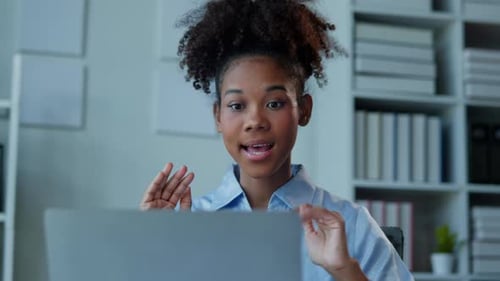 African Businesswoman in suit is working on laptop office space