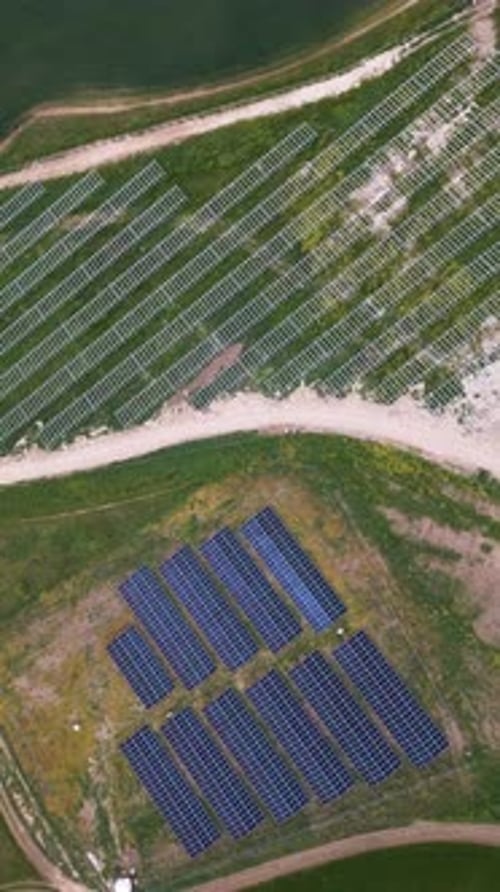 Aerial View of Solar Panels and Mounting Structures in a Rural Area Part of the Solar Farm is