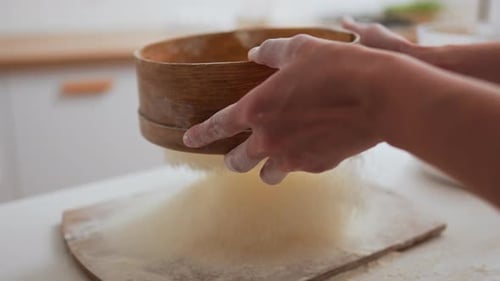 Sifting Flour With A Wooden Sieve For Baking Fine Flour Falls, The Hostess Prepares Flour For Baking