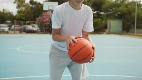 Breathing For Concentration Of A Basketball Athlete In The Outdoor Court