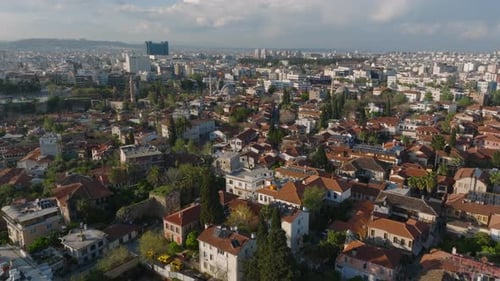 Aerial View of Buildings and Street in Old Town at Golden Hour Cityscape Lit By Late Afternoon