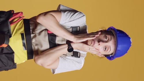 Vertical Video Portrait of Sleepy Tired Handywoman Working on Construction