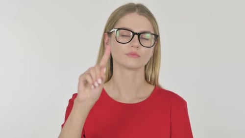 Young Woman in Denial on White Background
