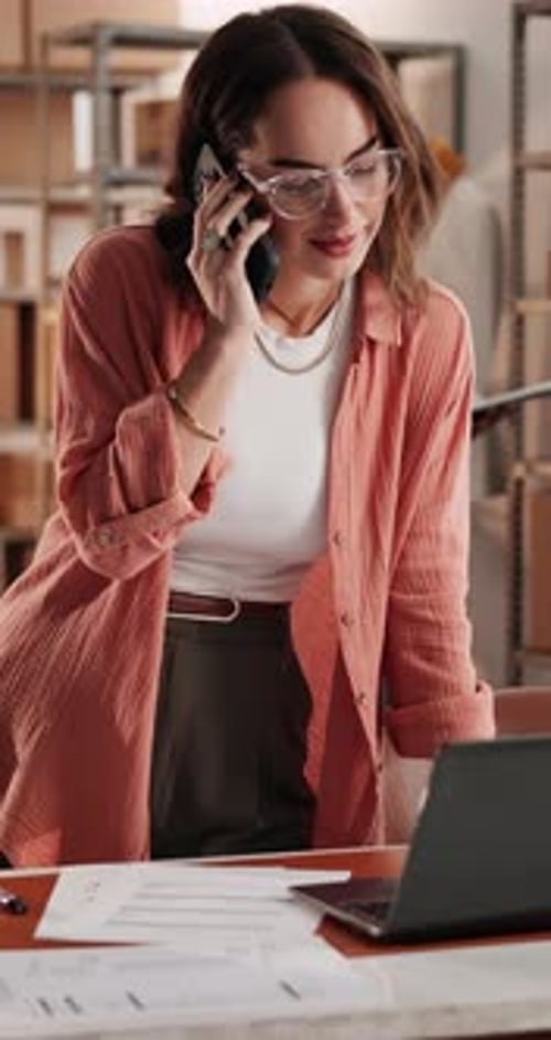 Phone call, ecommerce and laptop with woman in warehouse for delivery confirmation