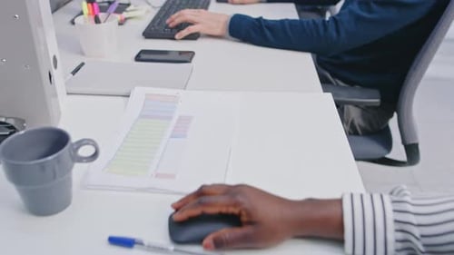 Close Up Shot of a Diverse Multinational Team of Business Managers Working on Desktop Computers. Sh