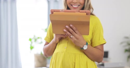 Hands, tablet and research with a business pregnant woman at work on a creative project