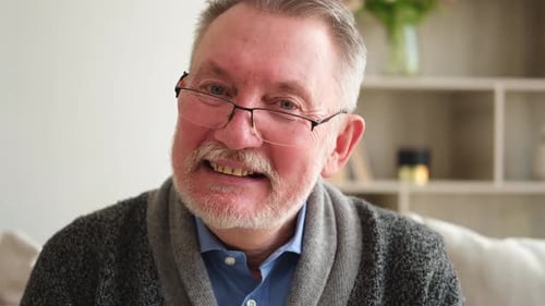 Senior Man Smiling Warmly at Home, Close Up