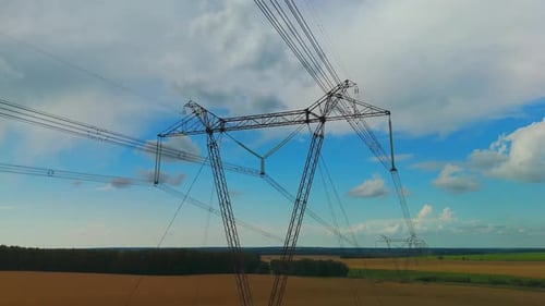 High Voltage Electric Pylon Standing in a Rural Landscape