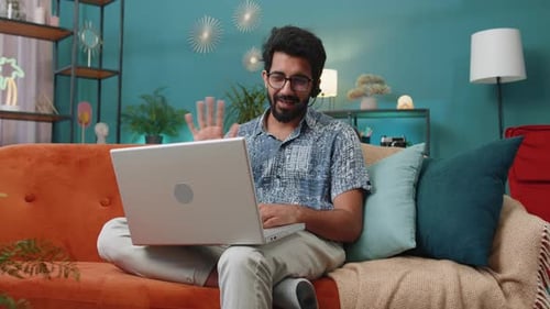 Indian Man Freelance Worker Call Center or Support Service Operator Helpline Having Talk with Client