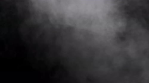 Abstract Smoke Billowing Against Black Backdrop