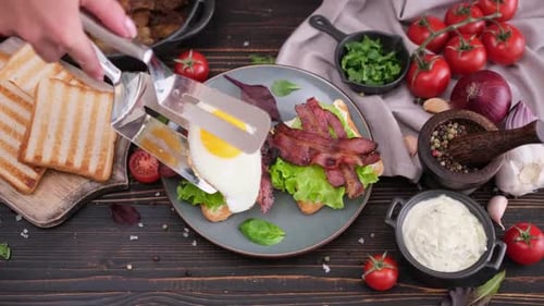 Preparing Open Faced Bacon Sandwich with Egg