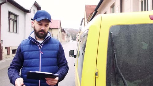 Delivery Man Delivering Parcel Box to Recipient