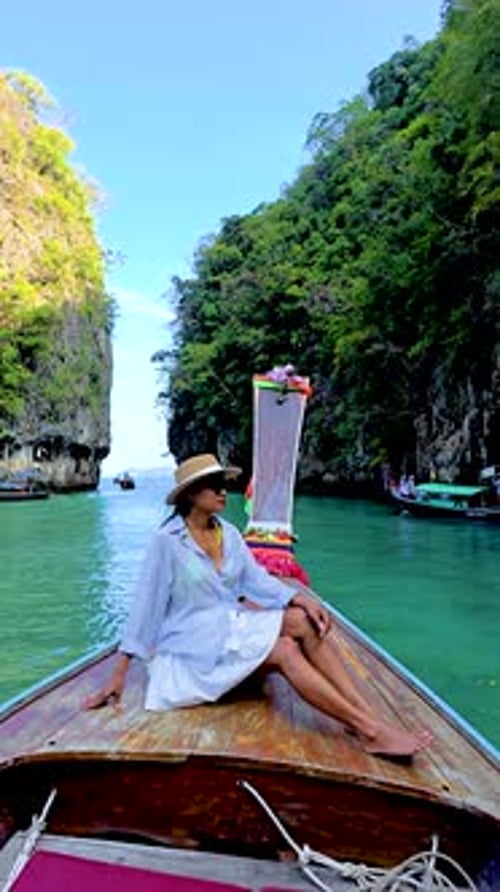 Explore the Serene Beauty of Koh Hong Island in Thailand Aboard a Traditional Longtail Boat