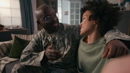 Military Father and Son Talk at Home