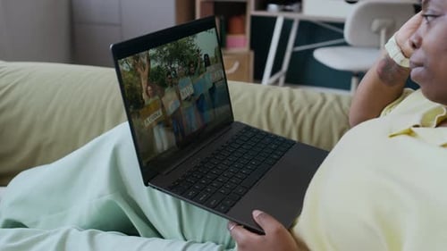 Watching News Broadcast about Riots of Activists and Speech of Their Leader