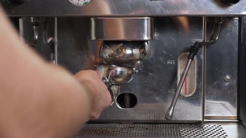 Espresso Machine Making Dark Coffee in Workplace