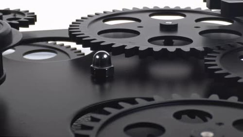 Black Gears and Cogs with Reflective Metal Ball