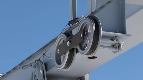 Cable Car Roller Wheels with Steel Rope Pulley System, Close Up Shot.