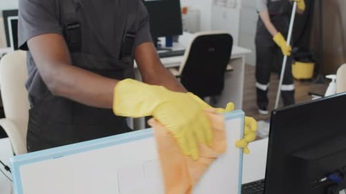 Claening Service Staff Working In Office