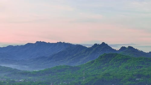 Nature landscape of Indonesia Menoreh hills in the morning. Countryside, forest on the mountain.