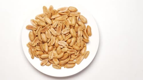 Processed Pea Nuts in a Bowl on Table Top Down