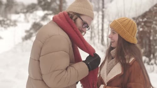 Romantic Couple in Winter Forest