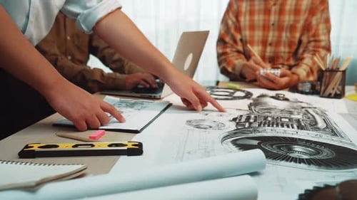 Engineers Collaborate on a Complex Mechanical Design