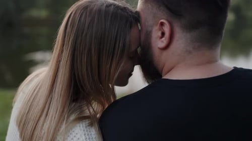 Loving Couple Sharing Intimate Moment Outdoors