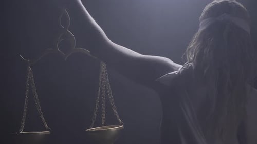 Close Up of Themis Looking Up to the Scales View From the Back