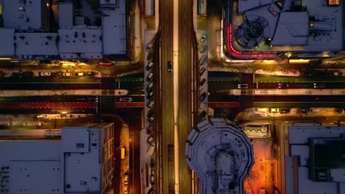bird's eye view Berlin illuminating shopping street snowed at night. Majestic aerial view drone