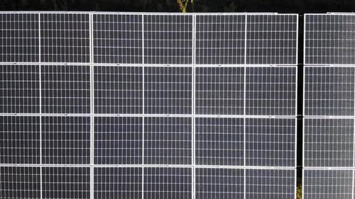 Solar Cell Panels In A Photovoltaic Power Plant - aerial sideways