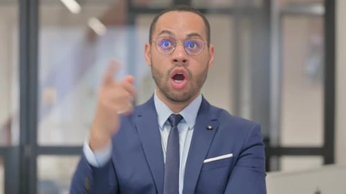 Portrait of Pensive Mixed Race Businessman Thinking New Idea