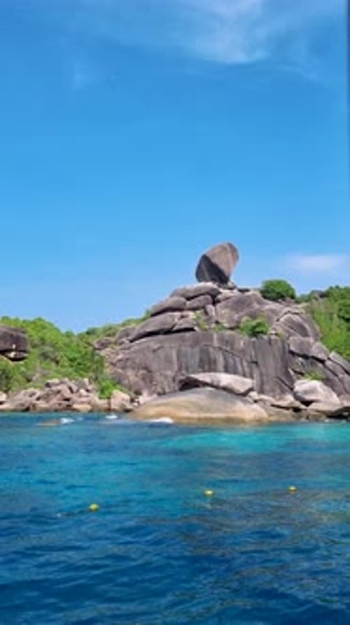 White Beach and Turqouse Colored Ocean with Big Boulders in Ocean at Similan Islands Thailand