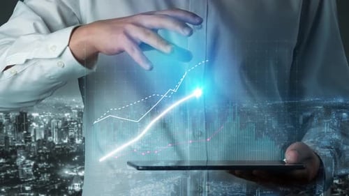 Geschäftsmann analysiert digitale Datentrends mit einem futuristischen Tablet-Display mit Risin