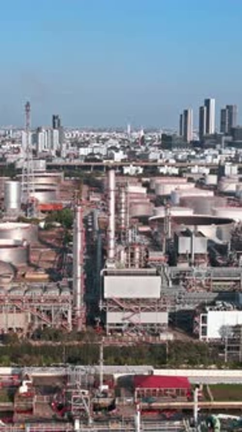 Industrial landscape of Bangkok with factories and skyline in view
