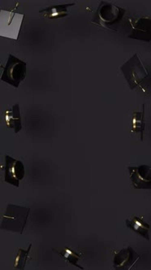 Random rotating graduation black caps with copy space.