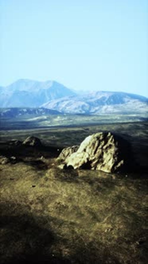 Large Rock on Grass Field