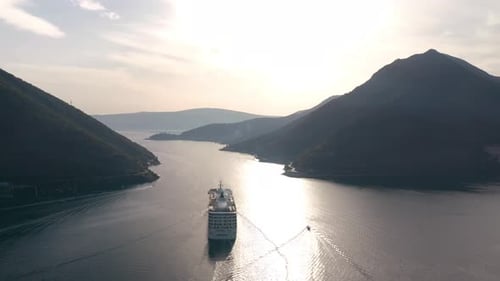 Large cruise ship passing through the picturesque bay of Kotor in Montenegro