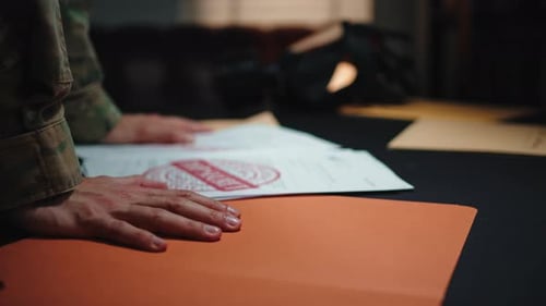 Military Personnel Reviews Top Secret Documents