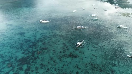 Aerial Drone View of Boats Anchored in the Bay with Clear and Turquoise Water Boat and Yacht in the
