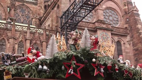festive decorations on top of a shopping chalet at a Festive Christmas market in Strasbourg, France