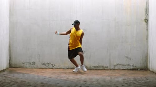 Young Adult Dancing in an Urban Environment