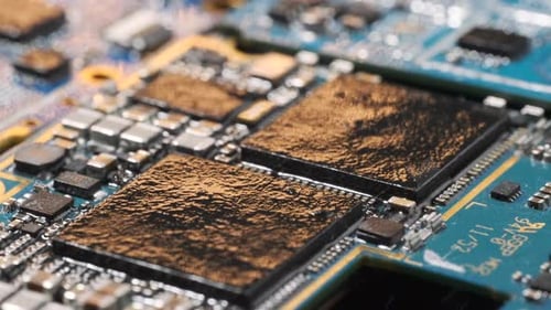 Close up spent printed circuit microchip macro tracking shot background. Surface of computer chips