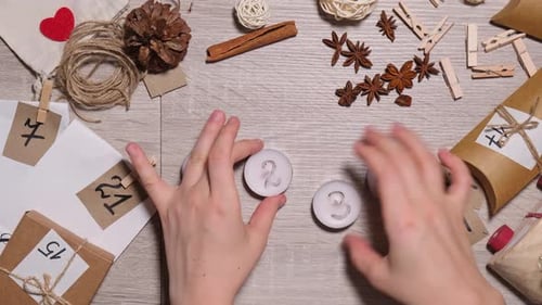 Preparing Christmas Advent Calendar with Handmade Decorations