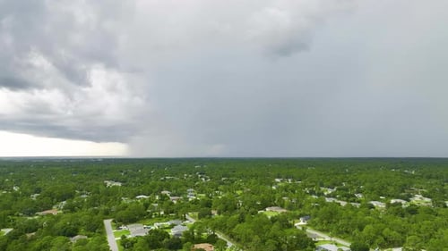 Dark Stormy Clouds Forming on Gloomy Sky Before Heavy Rainfall Over Suburban Town Area